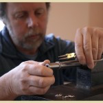 Luke designing a piece of jewellery