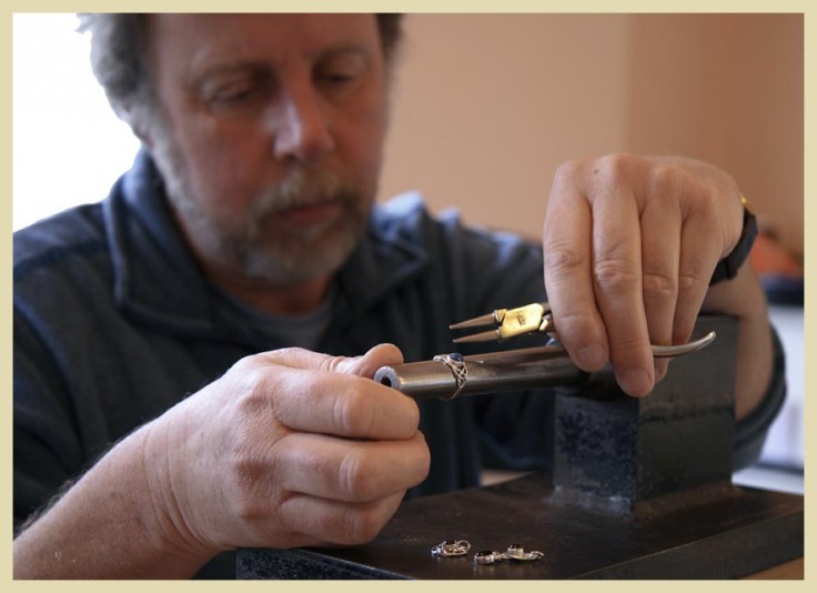 Luke designing a piece of jewellery
