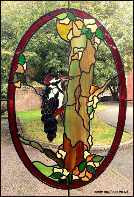 Woodpecker glass pattern window design